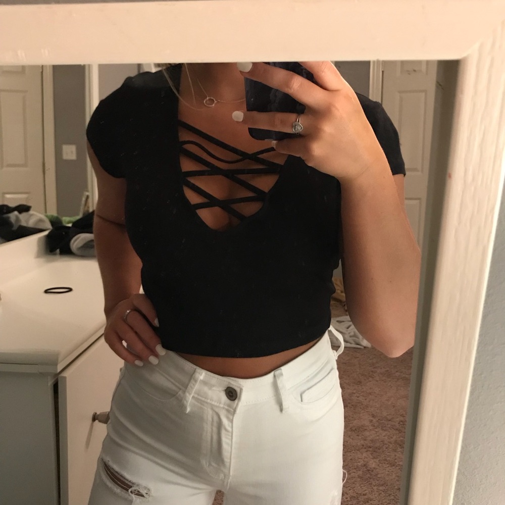 Black v neck crop top with crossed top.